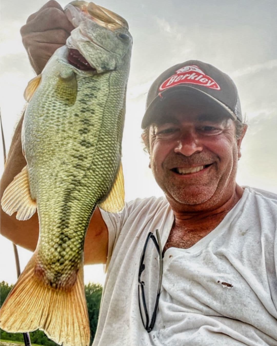 Chuck Richards with largemouth bass caught frog fishing with Slay Sauce
